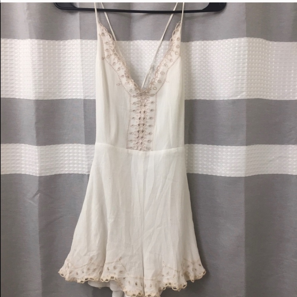 Lush white and tan trim romper